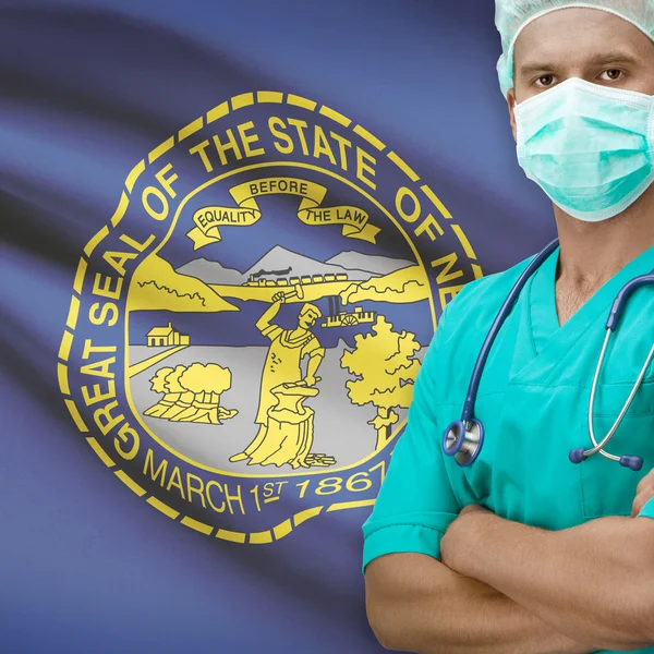 Surgeon with US states flags on background series - Nebraska — Stock Photo, Image
