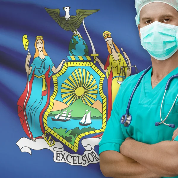 Surgeon with US states flags on background series - New York — Stock Photo, Image