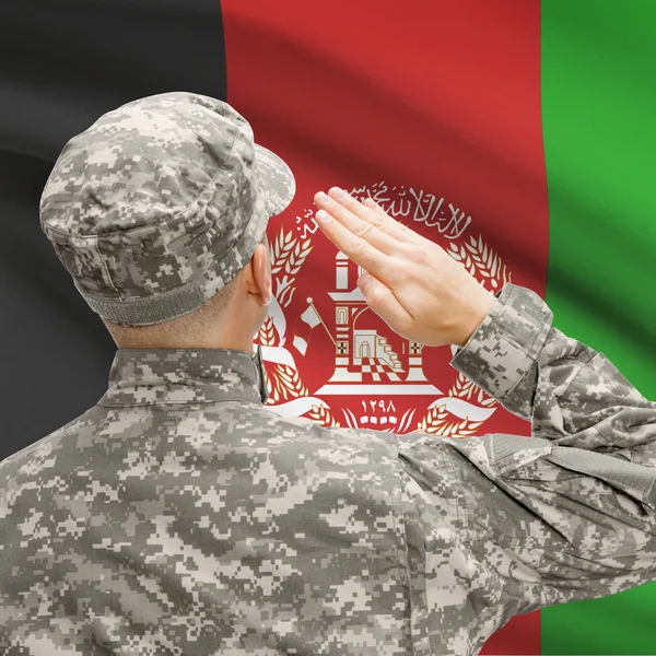 Soldier in hat facing national flag series - Afghanistan — Stock Photo, Image