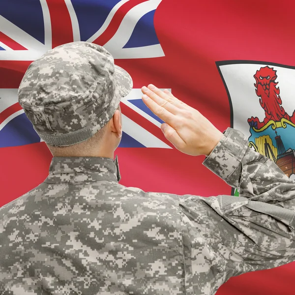 Soldier in hat facing national flag series - Bermuda — Stock Photo, Image