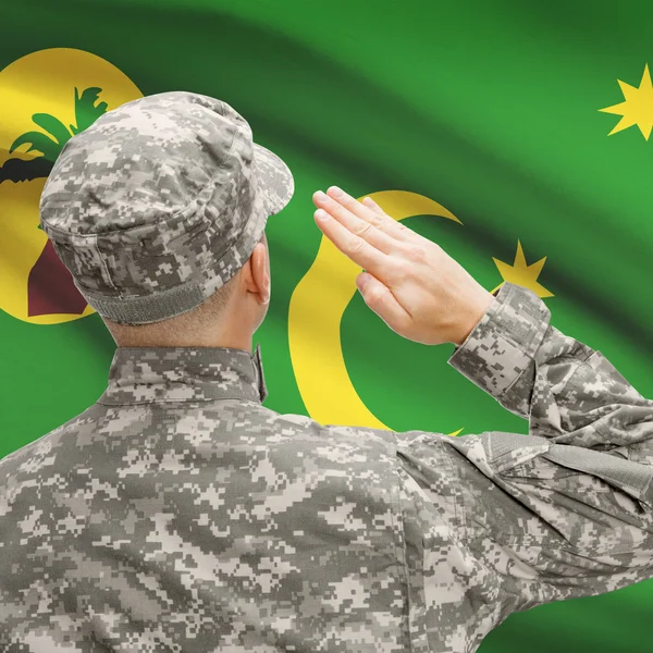 Soldat au chapeau face à la série des drapeaux nationaux - Cocos (Keeling) Isl — Photo