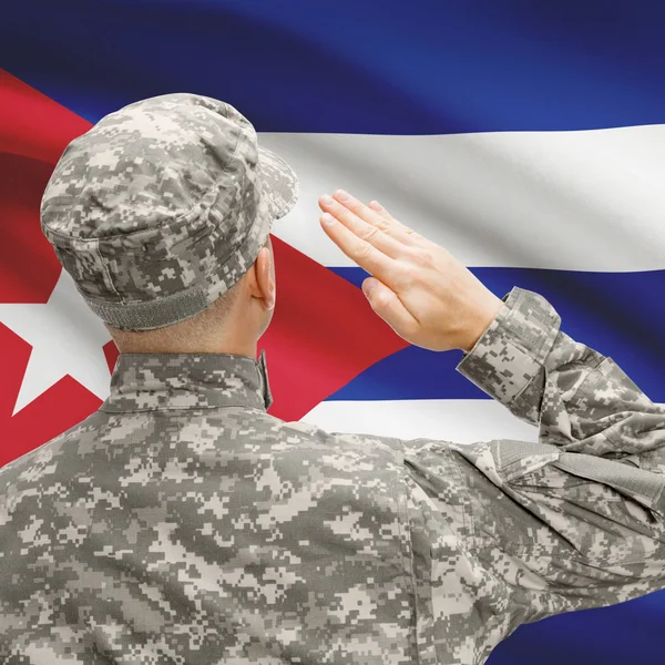 Soldado em chapéu virado para a série de bandeira nacional - Cuba — Fotografia de Stock