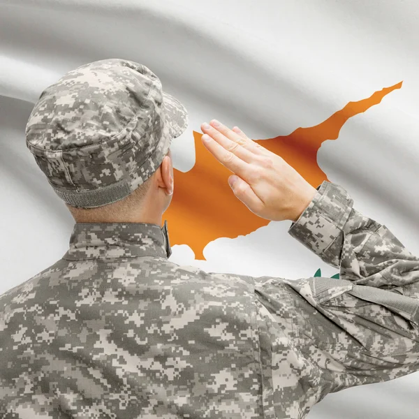 Soldier in hat facing national flag series - Cyprus — Stock Photo, Image