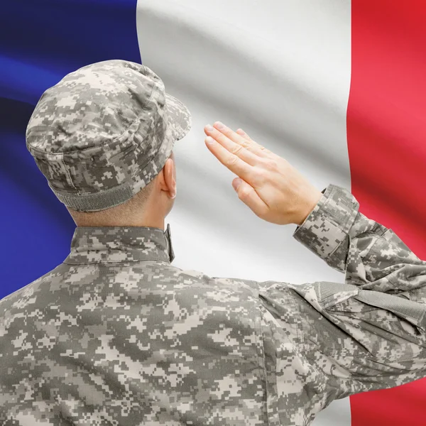 Soldier in hat facing national flag series - France — Stock Photo, Image