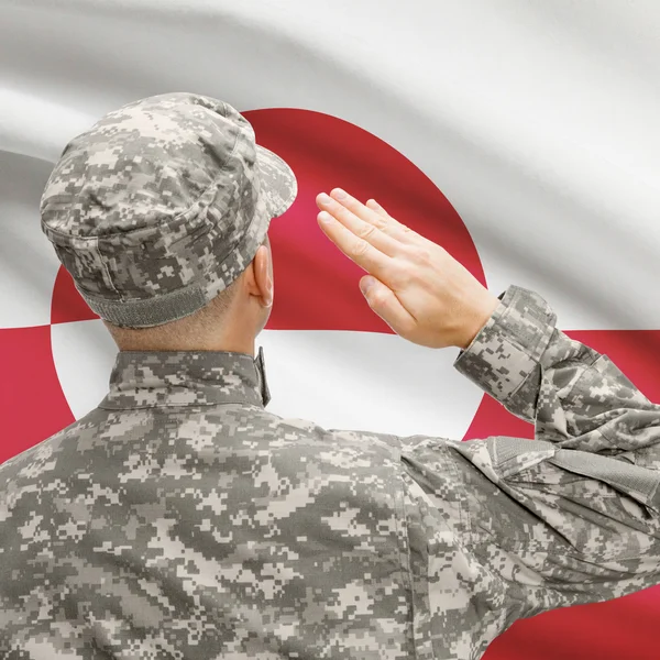 Soldier in hat facing national flag series - Greenland — Stock Photo, Image