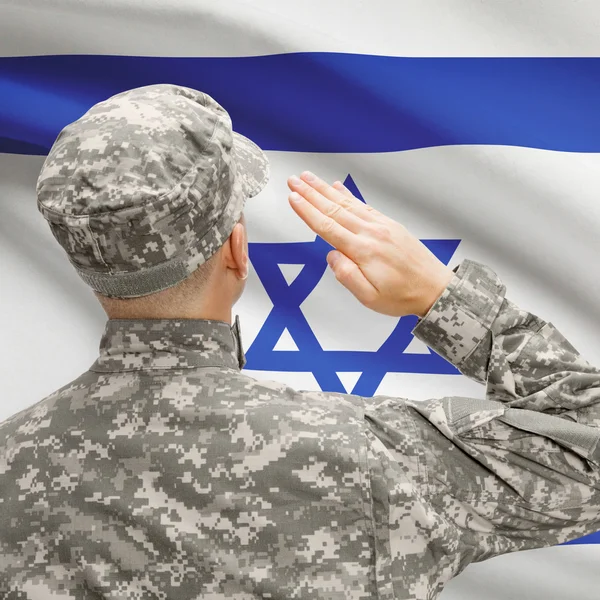 Soldier in hat facing national flag series - Israel — Stock Photo, Image