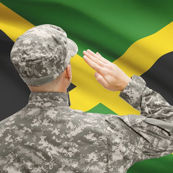 Soldier in hat facing national flag series - Jamaica — Stock Photo, Image
