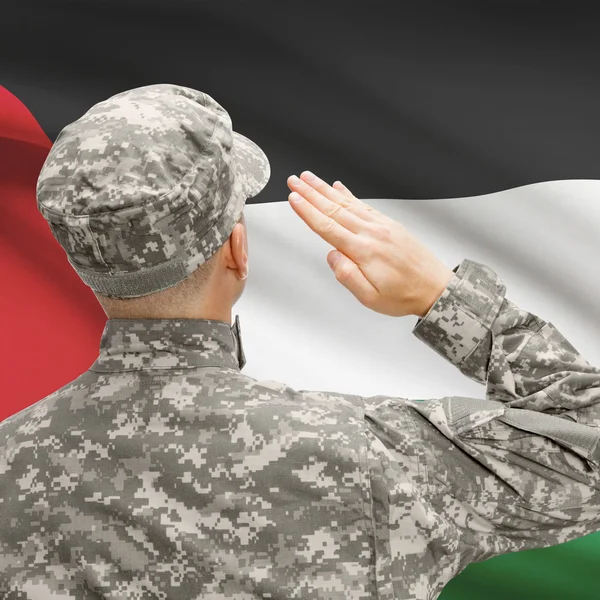 Voják v klobouku čelí státní vlajka series - Palestina — Stock fotografie