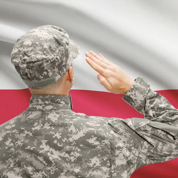 Soldado en sombrero ante serie de bandera nacional - Polonia — Foto de Stock