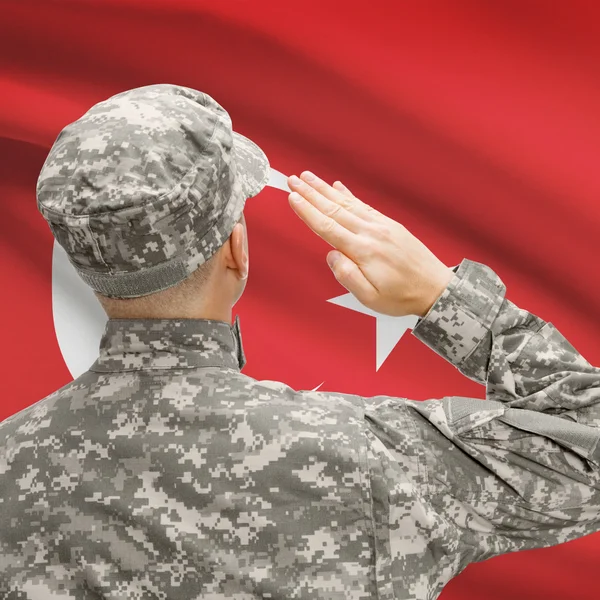 Żołnierz w kapeluszu w obliczu flagi narodowej serii - Turcja — Zdjęcie stockowe