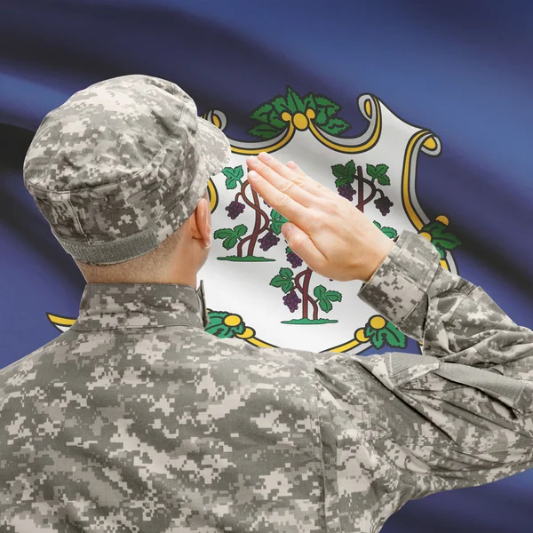 Soldier saluting to US state flag series - Connecticut — Stock Photo, Image