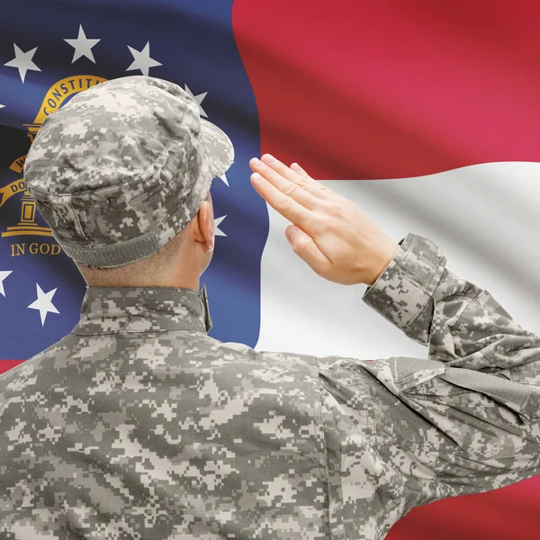 Soldier saluting to US state flag series - Georgia — Stock Photo, Image