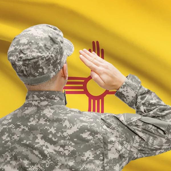 Soldier saluting to US state flag series - New Mexico — Stock Photo, Image