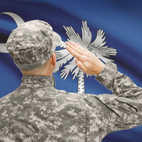 Soldier saluting to US state flag series - South Carolina — Stock Photo, Image