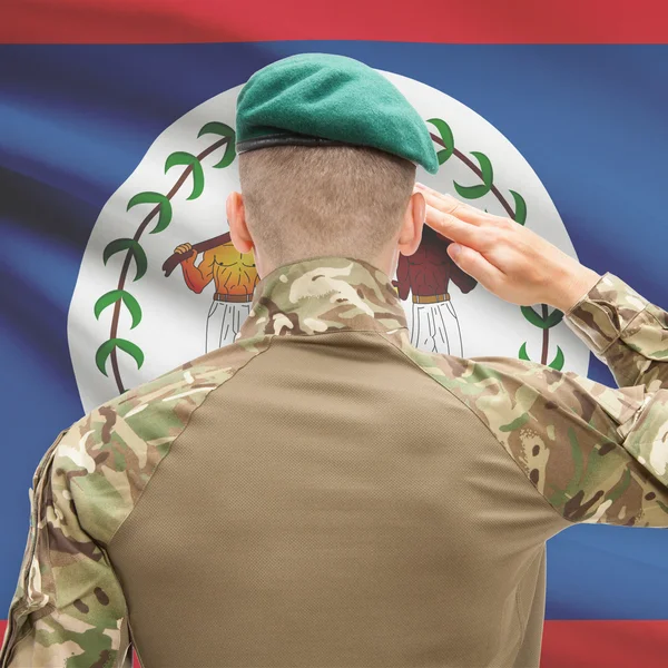 National military forces with flag on background conceptual series — Stockfoto