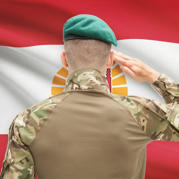 National military forces with flag on background conceptual seri — Stock fotografie