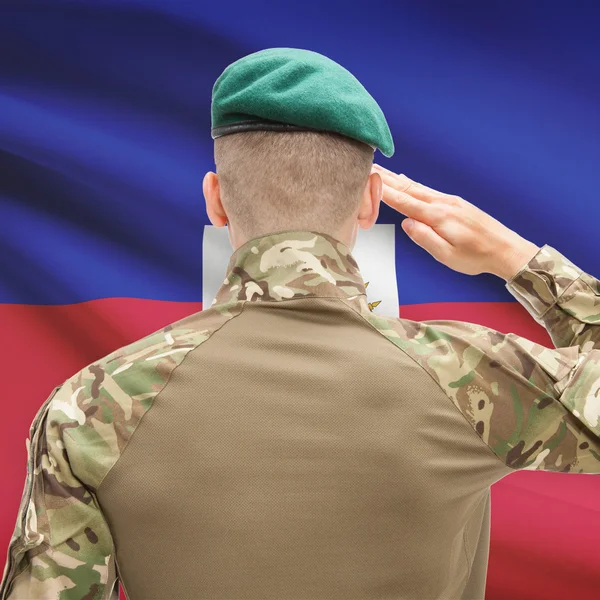 National military forces with flag on background conceptual seri — Stockfoto