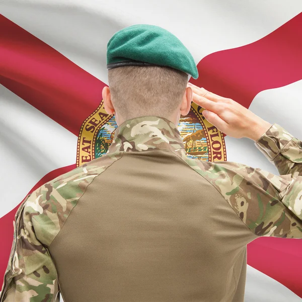 Soldier saluting to USA state flag conceptual series - Florida — Stock Photo, Image