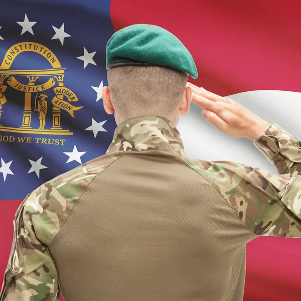 Voják zdravit Usa státu vlajky koncepční řady - Georgia — Stock fotografie