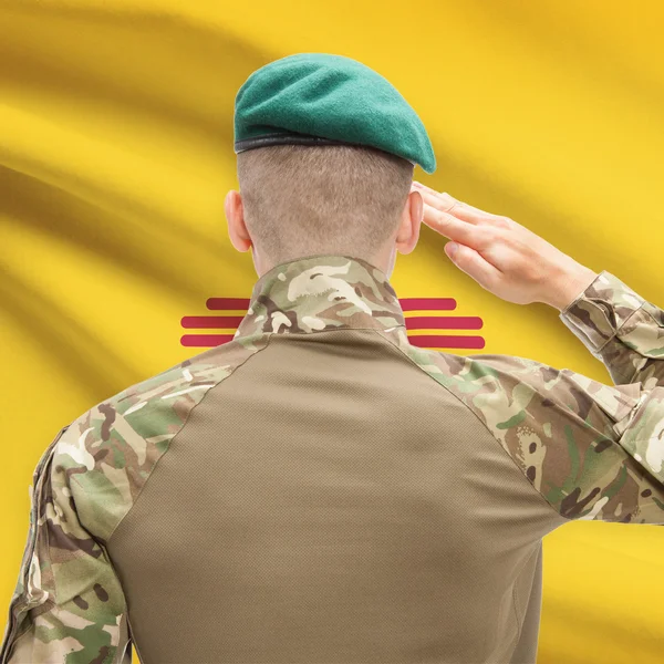 Soldier saluting to USA state flag conceptual series - New Mexic — Stockfoto