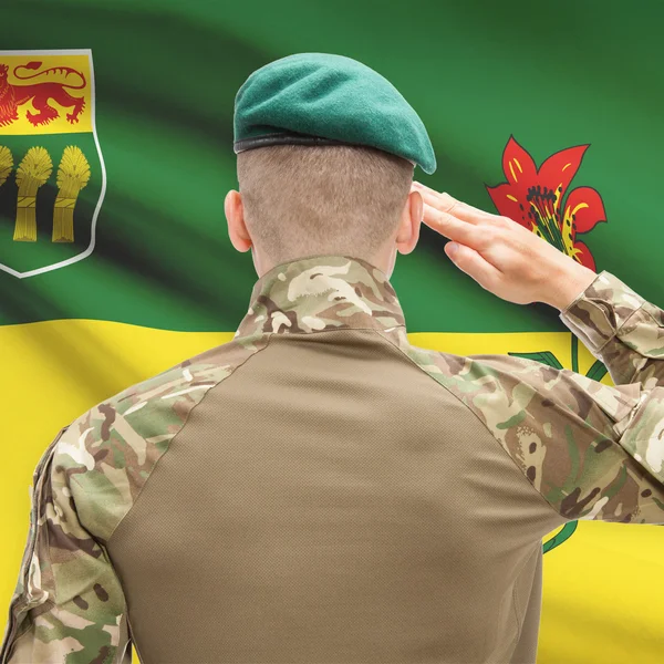 Soldier saluting to Canadial province flag conceptual series - S — Stock Photo, Image