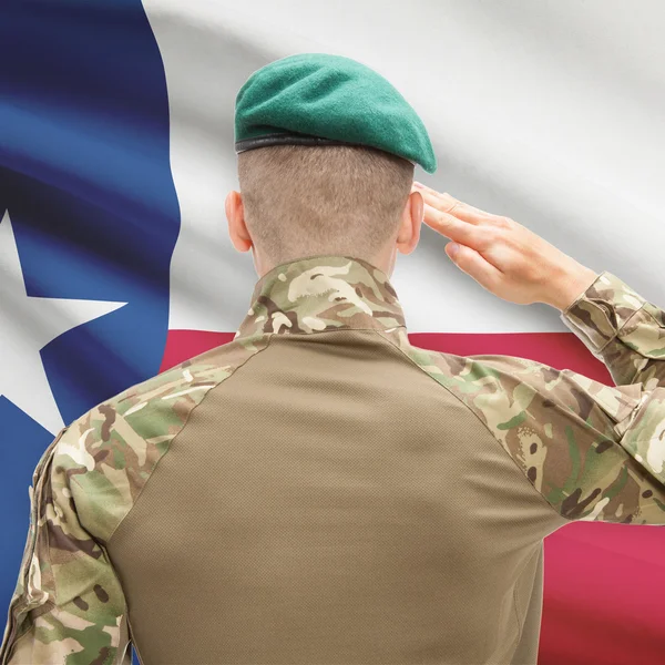 Soldier saluting to USA state flag conceptual series - Texas — Stock Photo, Image