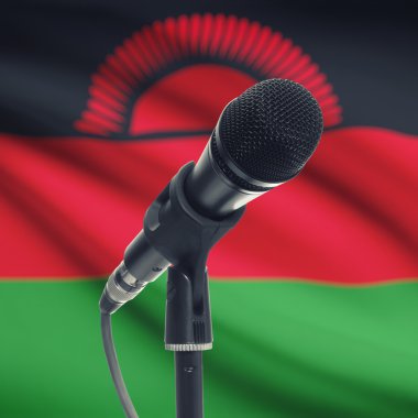 Arka plan - Malawi Ulusal bayrağını ile stand mikrofon