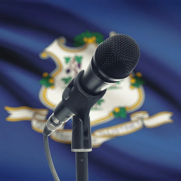 Microphone on stand with US state flag on background - Connectic — Stockfoto