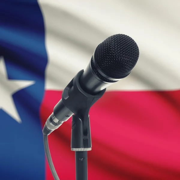 Microphone on stand with US state flag on background - Texas — Stock Photo, Image