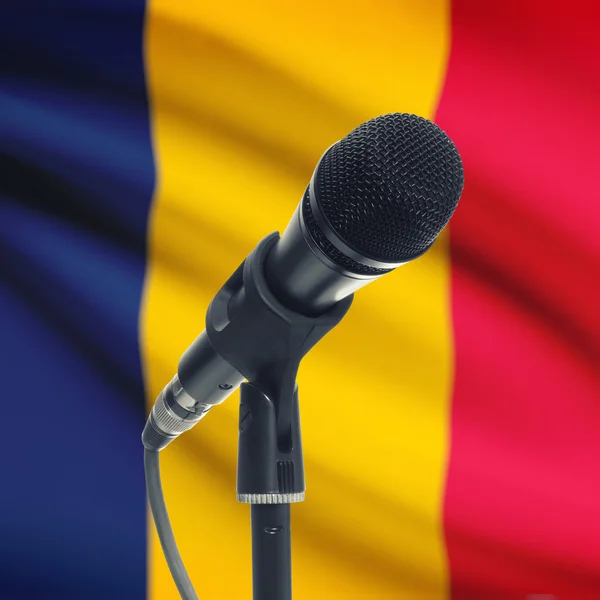 Microphone on stand with national flag on background - Chad — Stock Photo, Image