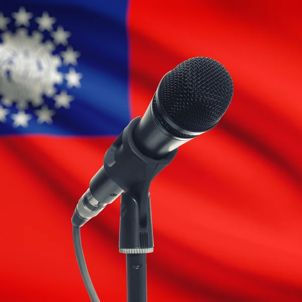 Microphone on stand with national flag on background - Burma — Stock Photo, Image