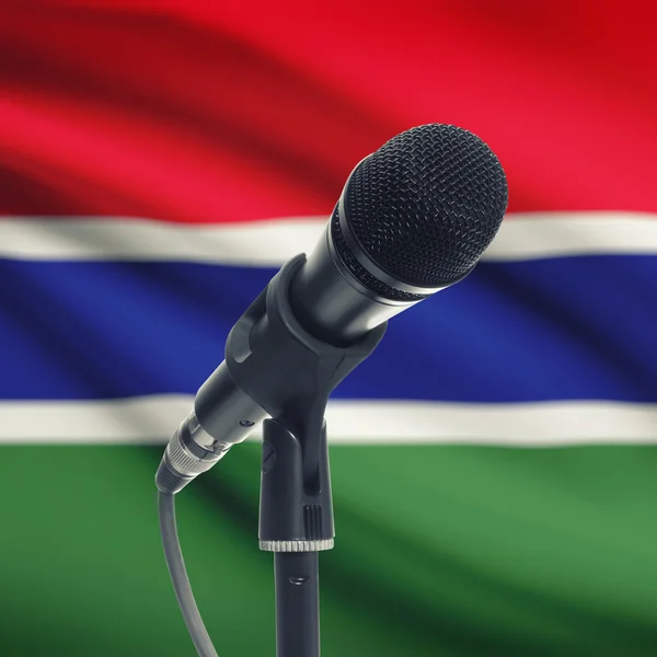 Microphone on stand with national flag on background - Gambia — Stock Photo, Image