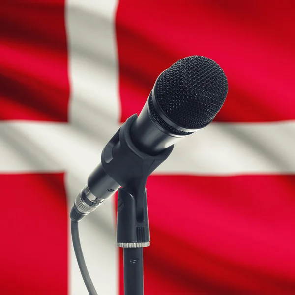 Microphone on stand with national flag on background - Denmark — Stock Photo, Image