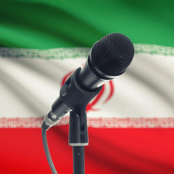 Mikrofon állvány, nemzeti zászló a háttérben - Irán — Stock Fotó