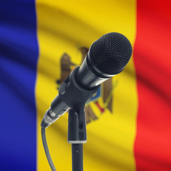Microphone on stand with national flag on background - Moldova — Stock Photo, Image