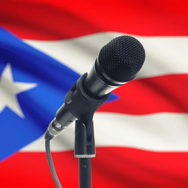 Microphone on stand with national flag on background - Puerto Ri — Stock fotografie