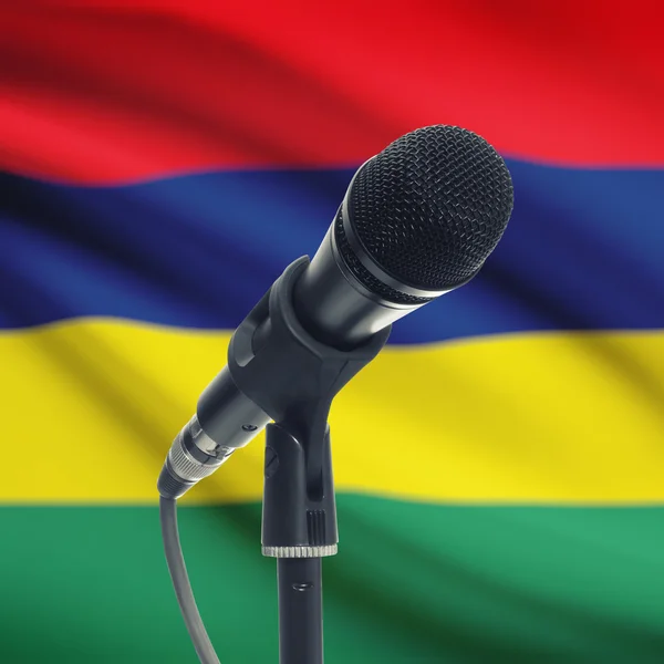 Microphone on stand with national flag on background - Mauritius — Stock Photo, Image