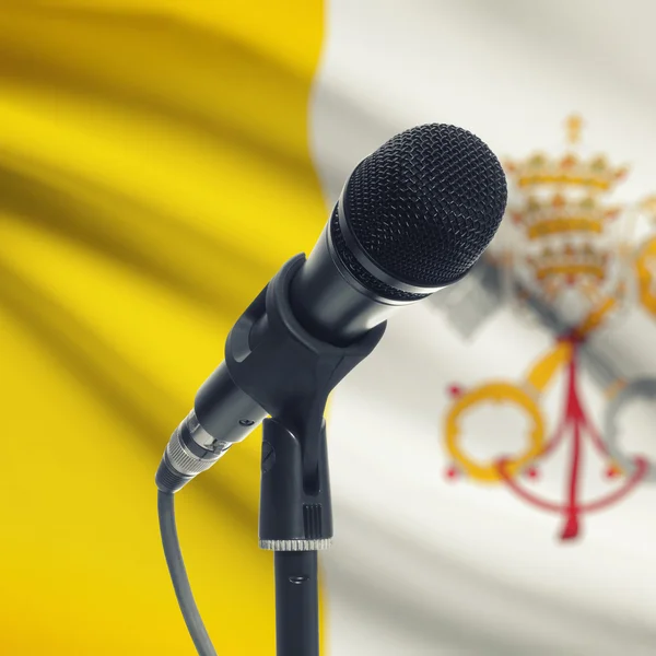 Microphone on stand with national flag on background - Vatican C — Stock Photo, Image