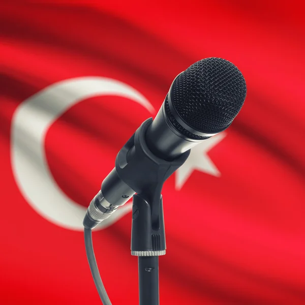 Microphone on stand with national flag on background - Turkey — Stock Photo, Image