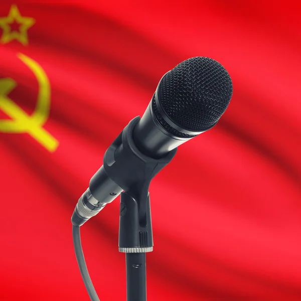 Microphone on stand with national flag on background - USSR - So — Stock Photo, Image