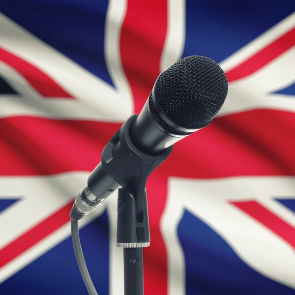 Microphone on stand with national flag on background - United Ki — Stock Photo, Image