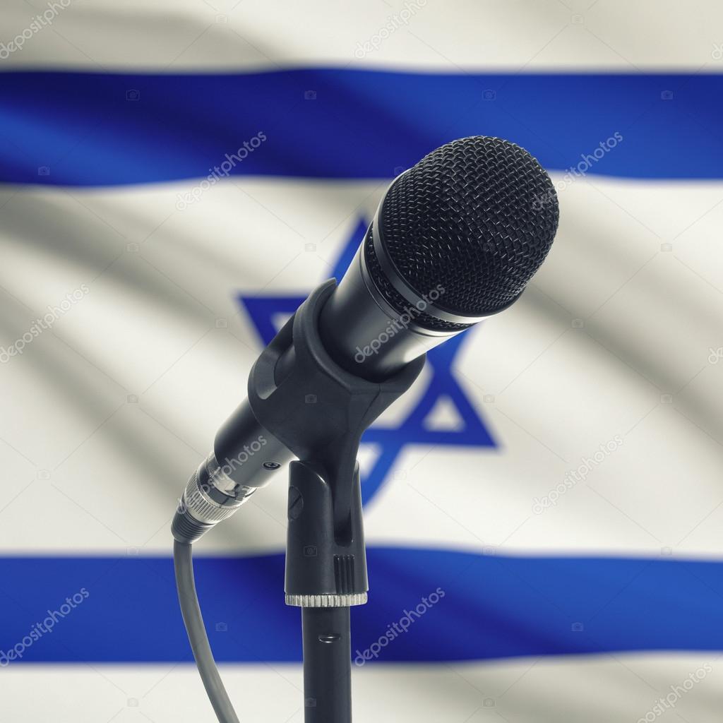 Microphone on stand with national flag on background - Israel