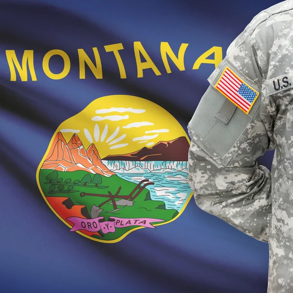 American soldier with US state flag series - Montana — Stock Photo, Image