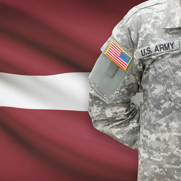 American soldier with flag series - Latvia — Stock Photo, Image