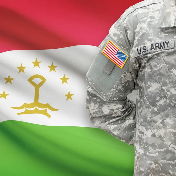 American soldier with flag series - Tajikistan — Stock Photo, Image