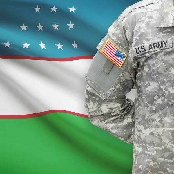 American soldier with flag series - Uzbekistan — Stock Photo, Image