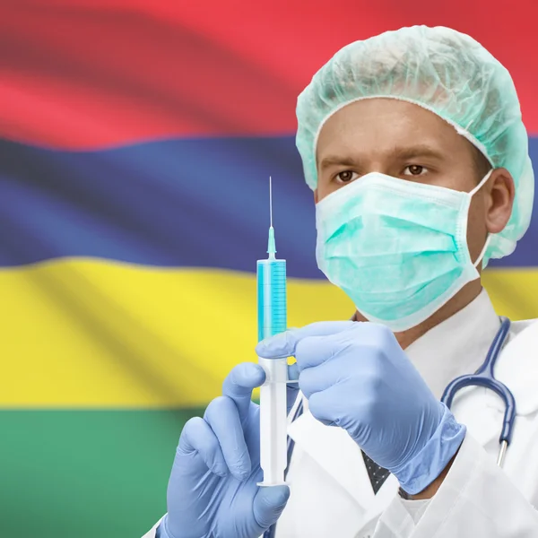 Arzt mit Spritze in Händen und Flag Serie - Mauritius — Stockfoto