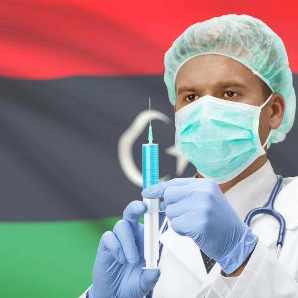 Läkare med spruta i händer och flag series - Libyen — Stockfoto