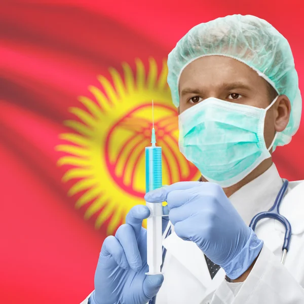 Doctor with syringe in hands and flag series - Kyrgyzstan — Stock Photo, Image