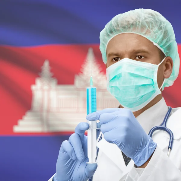 हाथों और ध्वज श्रृंखला में सिरिंज के साथ डॉक्टर कंबोडिया — स्टॉक फ़ोटो, इमेज